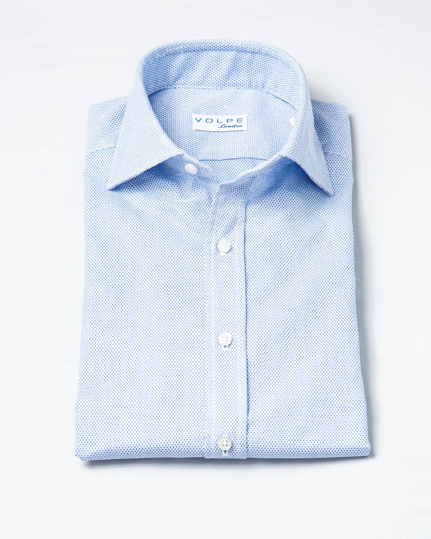 Blue business shirt with a button cuff